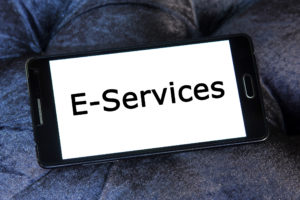 picture of cell phone with the word E-Services displayed on the screen